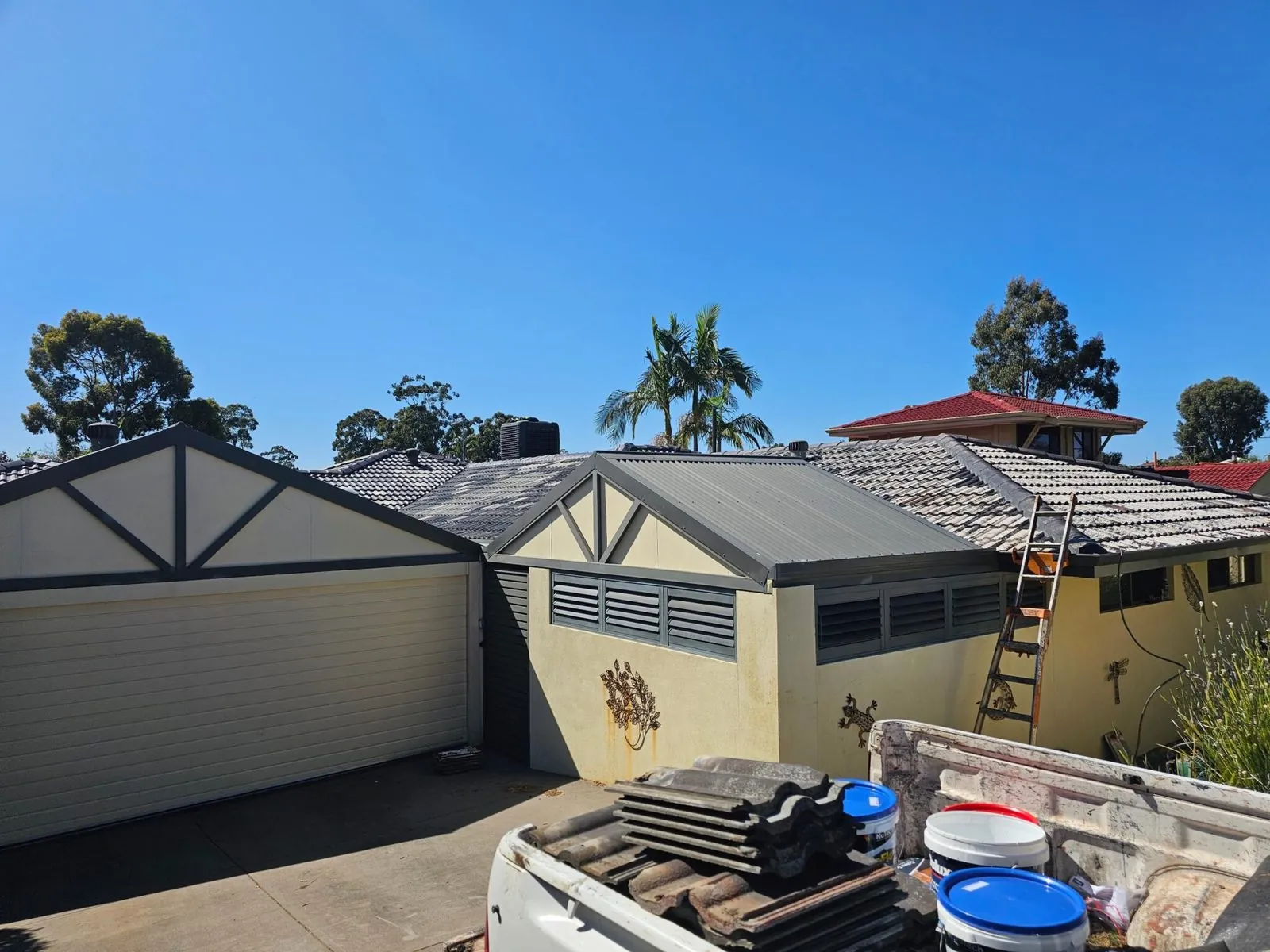 Roof repair work under way on a Perth home