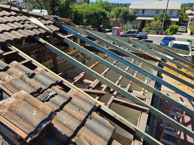 Old roof tiles stripped back to the battens on a Perth home